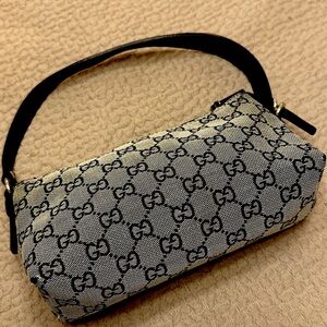 Vintage Gucci Monogram Boat Pochette.